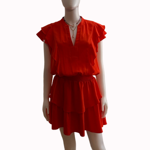 Amanda Uprichard Barrett’s dress orange